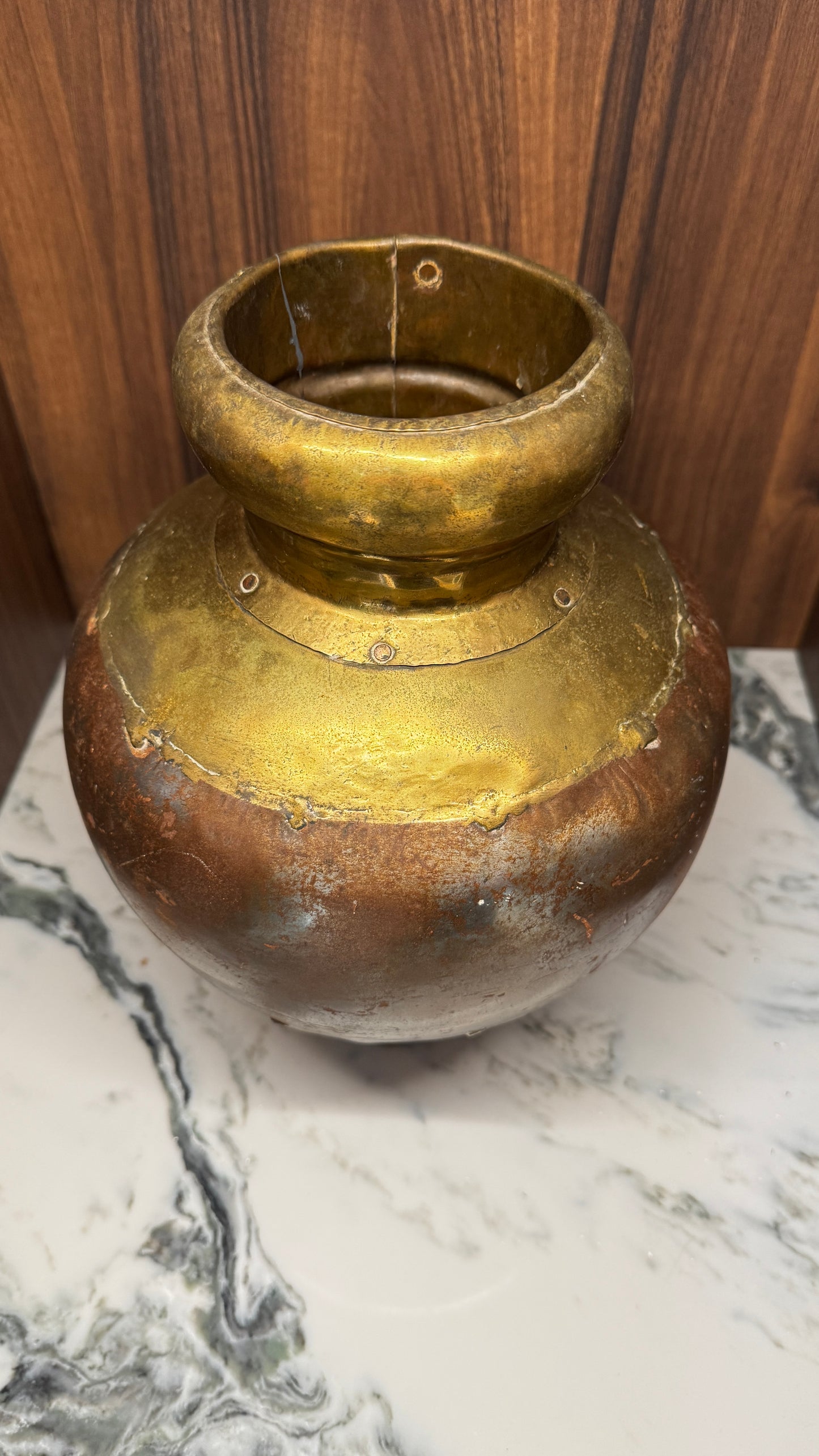 Beaten metal vase