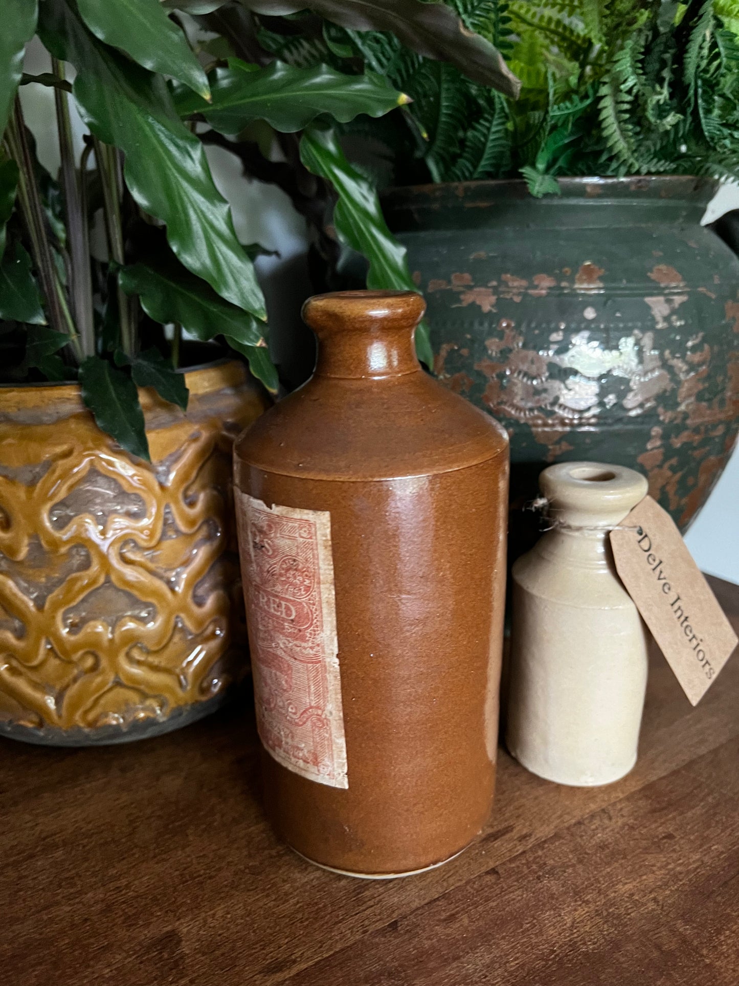Stoneware ink bottle with vintage label