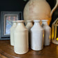 Medium salvaged stoneware bottle - cream