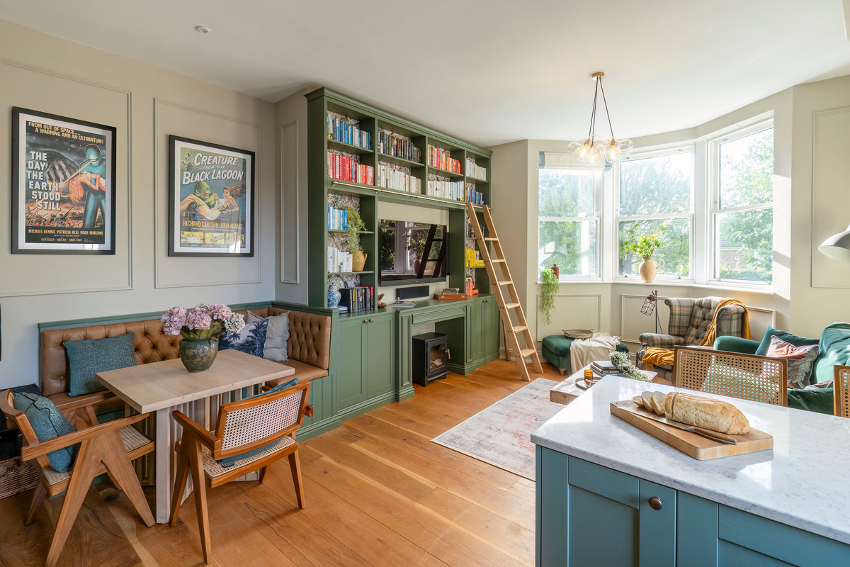A cosy corner of the Kent living room with warm neutral styling by Delve Interiors